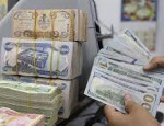 تصريف الدولار واستغلال المسافر العراقي